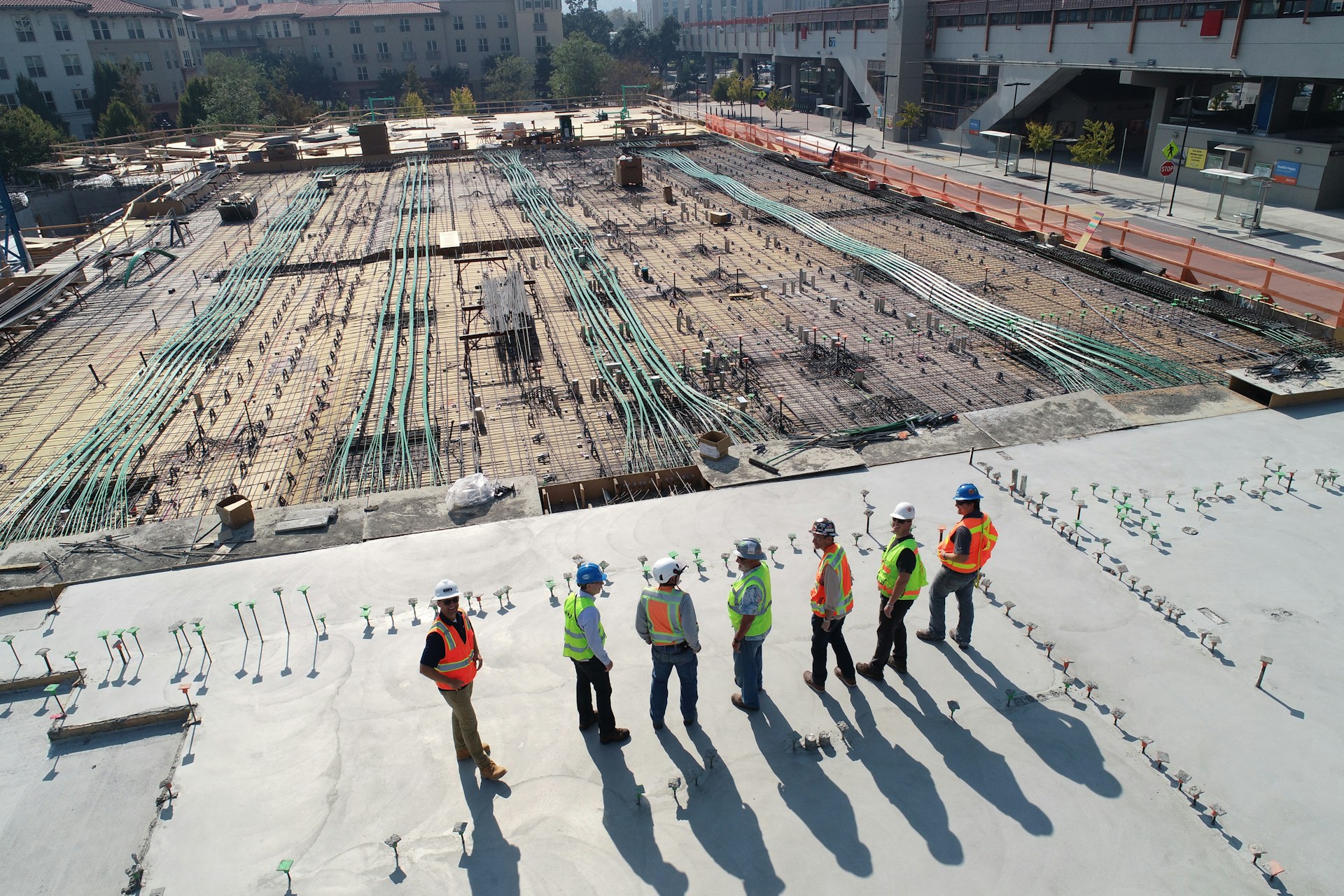 men working on site building foundation