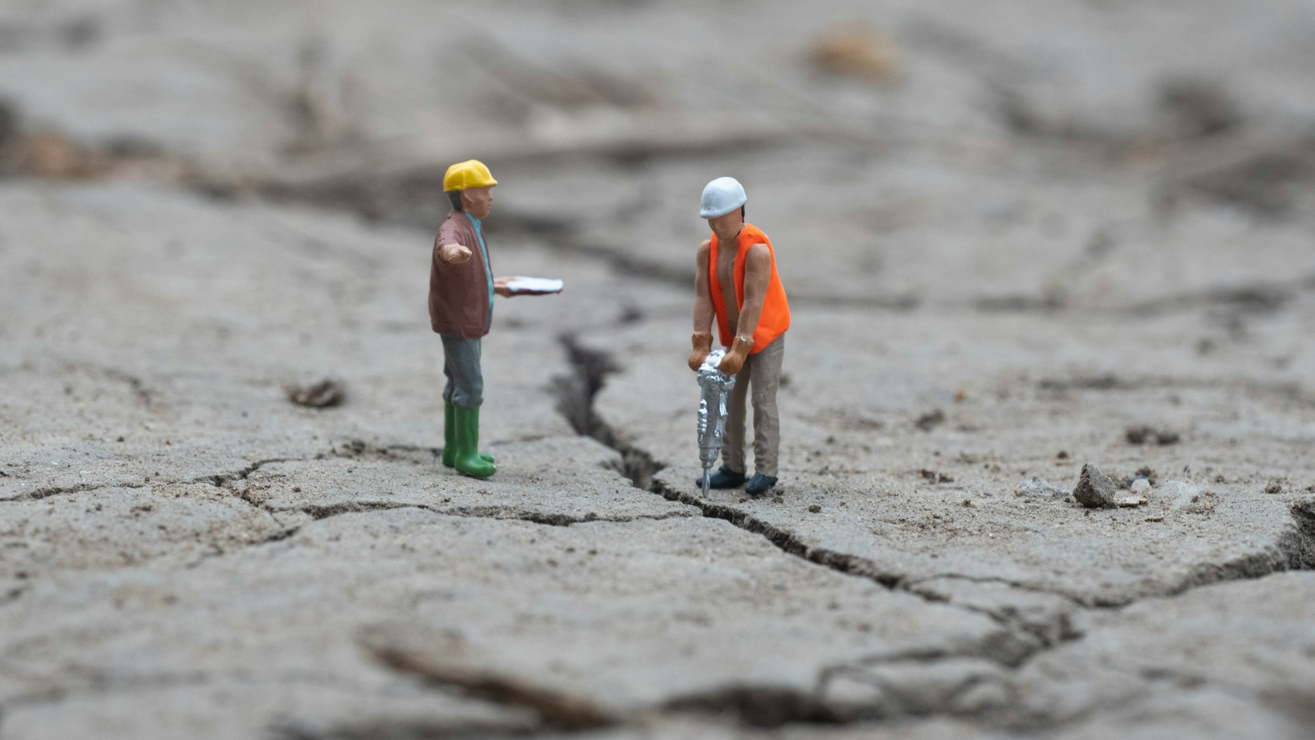 toy figures on concrete