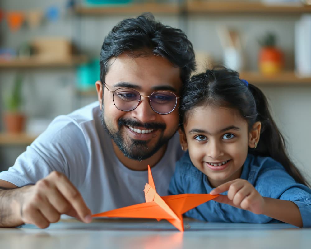 real estate agent in mumbai father and daughter playing in home